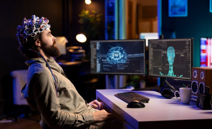IT specialist using high tech gear to chat with AI robot